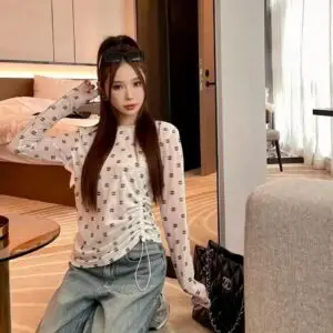 CHANEL Beige Crescent Moon Top