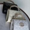 CHANEL Quilted Lambskin Sling Bag