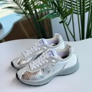 CHANEL Laminated Calfskin Suede CC Sneakers