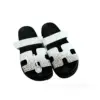 HERMES Chypre Men's Black & White Sandals